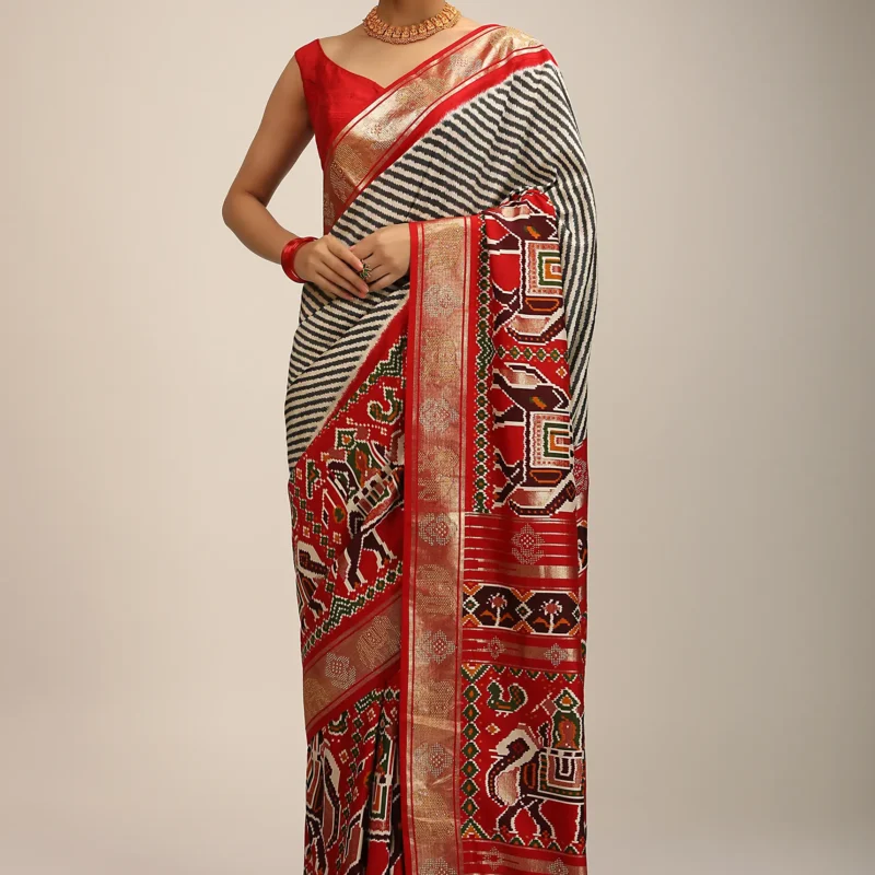 Red Saree In Silk With Multi Colored Patola Print And Diagonal Stripes